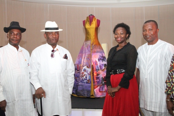 From L – R: Executive Secretary/CEO, National Institute for Cultural Orientation (NICO), Abuja, Dr. Barclays Ayakoroma, Bayelsa State Deputy Governor, Rear Admiral John Jonah (Rtd), an International Exhibitor, Patience Torlowei of Bayelsa State, and the Bayelsa State Commissioner for Culture & Ijaw National Affairs, Dr. Felix Tuodolor, during the send-forth ceremony of the award winning dress ‘Esther’ ( at the background) designed by Patience Torlowei, to the Smithsonian National Museum of African Art, Washington DC, at the Banquet hall, Government House, Yenagoa. Photo by Michael Owi.